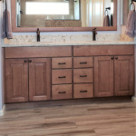 Bathroom Renovations with a wood cabinets and floors in Pheonix